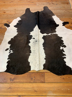 Genuine cow hide rug - Bill Worb Furs