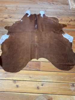 Genuine cow hide rugs - Bill Worb Furs