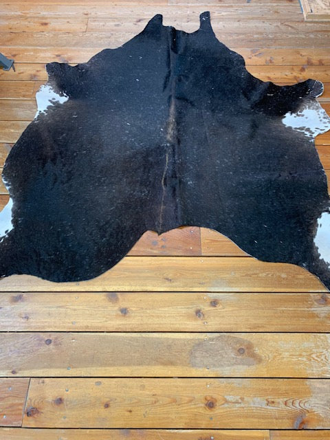 Genuine cow hide rug - Bill Worb Furs