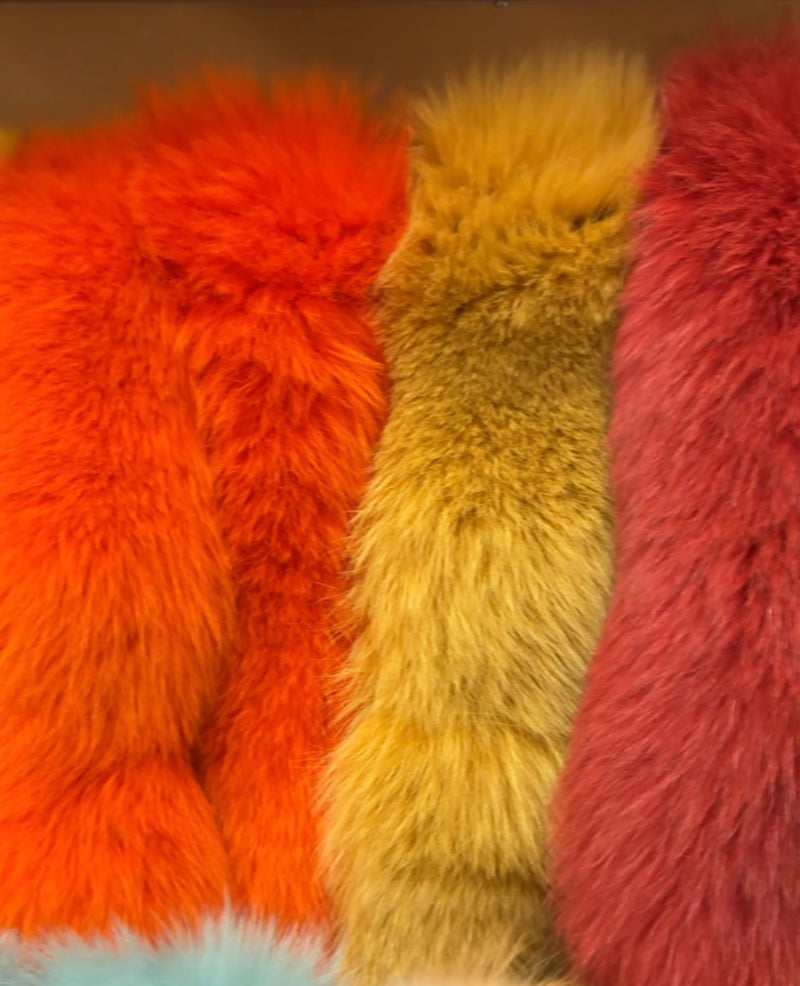 dyed blue fox fur skin stripping